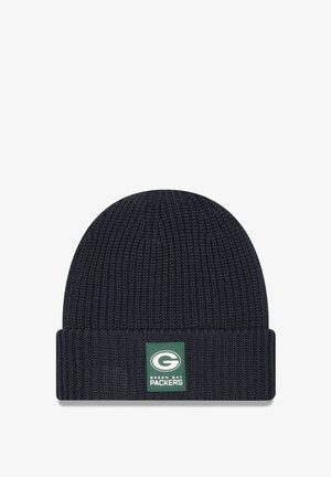 Navy knit beanie with a folded cuff, featuring a green patch with the "Green Bay Packers" logo in white lettering. Textured fabric.