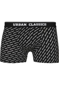 Schwarze Boxershorts mit einem wiederholenden weißen "URBAN CLASSICS" Logo-Druck. Weiches Material und elastischer Bund, entworfen für Komfort und Passform.