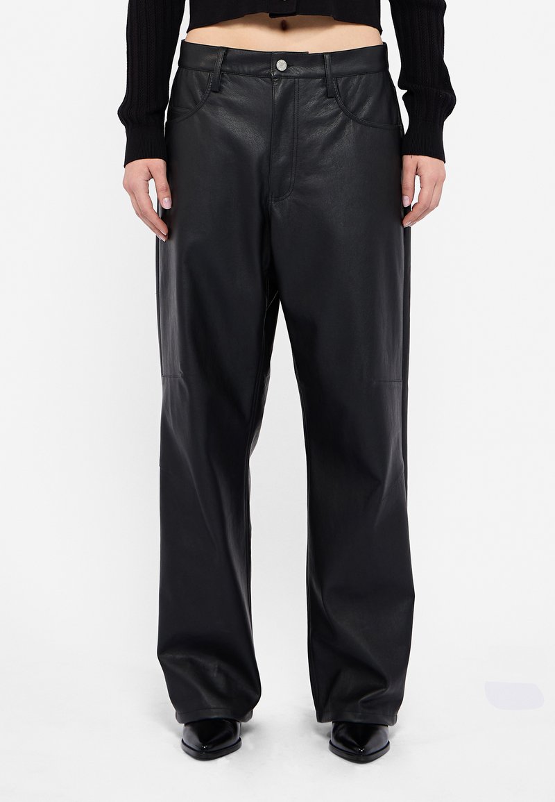 Black leather wide-leg pants with a smooth texture, featuring front pockets and a silver button closure. Tailored for a relaxed fit.