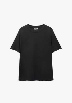 Črna majica iz bombaža, s krojem z okroglim izrezom, kratkimi rokavi in sproščenim prileganjem ter gladko teksturo.
