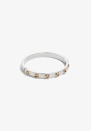 Bracciale in argento con finitura liscia, caratterizzato da accenti in hardware dorato. Progettato con una forma semplice e arrotondata, presenta cinque link decorativi.