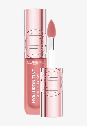 L'Oréal Paris Hyaluron Tint Lip Stain Serum i et slankt lyserødt rør med en blød applikatorspids, med præget logo og hvid tekst.