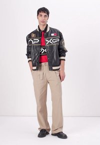 Tommy Hilfiger F1 MOVIE RACING VARSITY JACKET - Giacca in similpelle - black