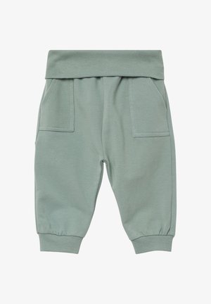 Jasnozielone bawełniane dresy z elastycznym pasem, dwiema przednimi kieszeniami i ściągaczami przy nogawkach. Gładka faktura, casualowy design.