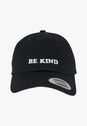 Black adjustable cap featuring white embroidered text "BE KIND." Smooth fabric, curved visor, and standard hat construction.