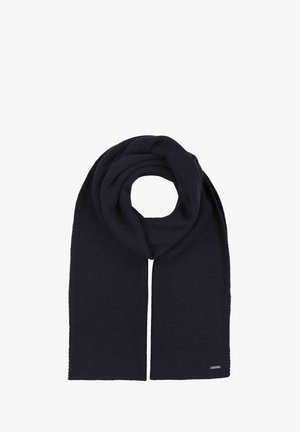 Kudottu tummansininen huivi, jossa on teksturoitu neulekuosi, sileät reunat ja pieni logotagi toisessa päässä.