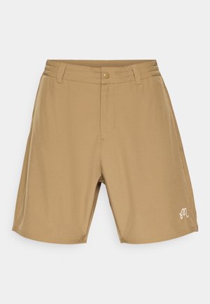 Beige shorts made of soft fabric, featuring a flat waistband, front button closure, and a small white embroidered logo on the left leg.