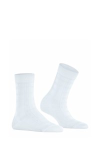 Białe bawełniane skarpetki z teksturowanym wzorem w kratkę, ściągacze prążkowane i wzmocniony palec. Standardowa długość za kostkę z gładkim wykończeniem.