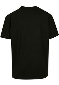 Sort bomulds t-shirt med korte ærmer, rund hals og lige kant. Glat tekstur, ingen mønstre eller logoer synlige.