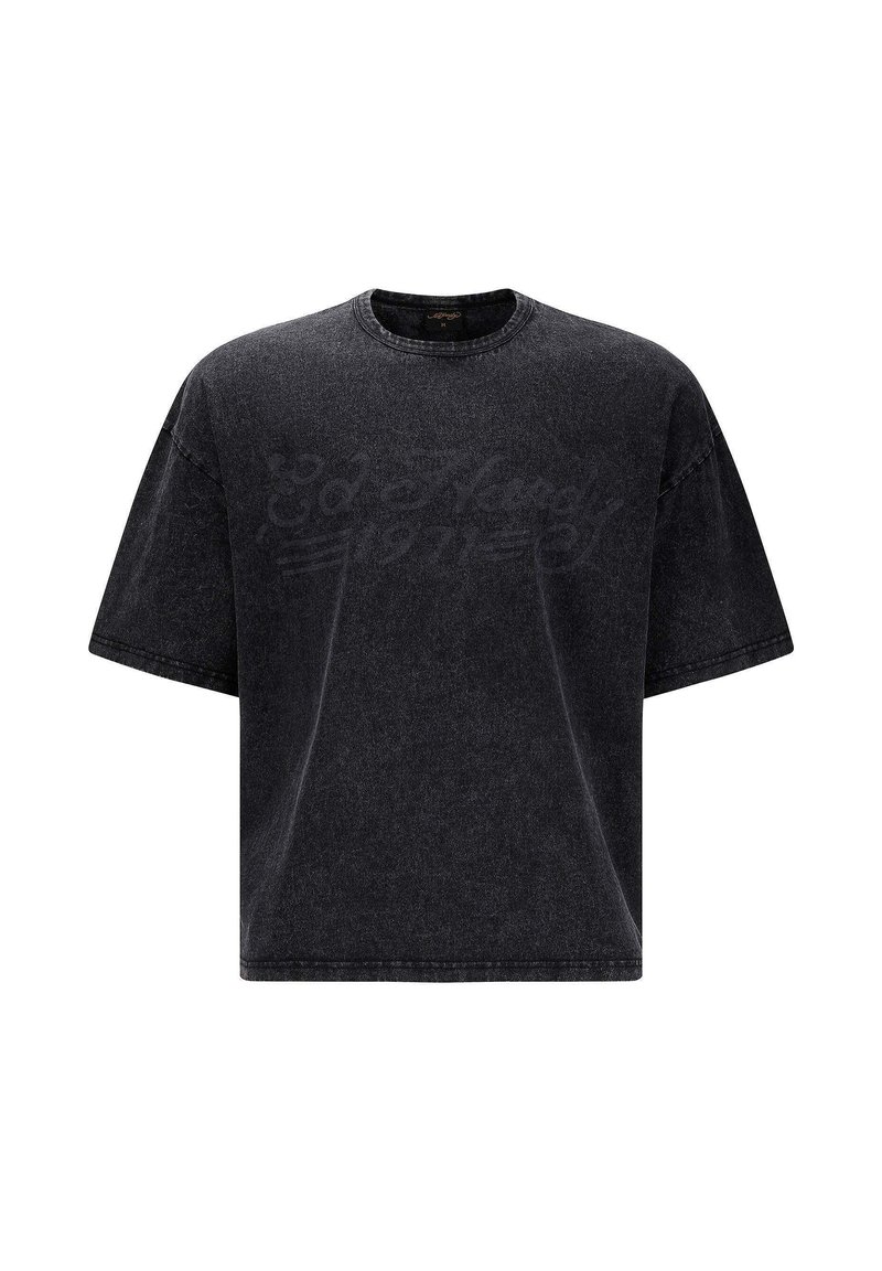 Sort oversized t-shirt lavet af denim, med rund hals og korte ærmer. Diskret logo trykt i en mørkere nuance på forsiden.