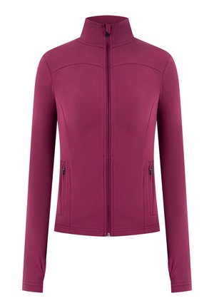 Chaqueta morada de manga larga con cremallera, cuello alto y bolsillos laterales con cremallera, diseñada para una silueta ajustada.