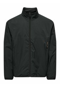 Black lightweight jacket with a high collar, full zip, and side pockets. Smooth texture with minimalistic design and subtle branding detail.