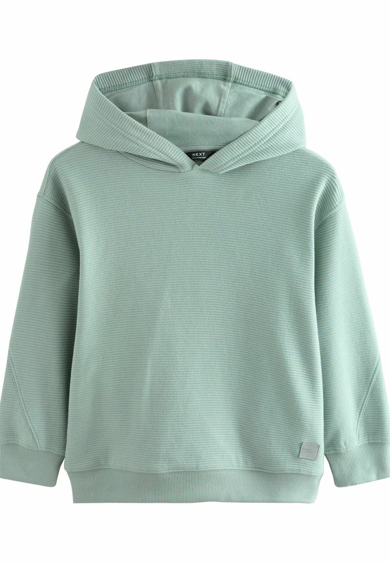 Sweatshirt à capuche vert clair avec texture côtelée, coutures latérales et une petite étiquette de marque près de l'ourlet. Manches longues et cou large.