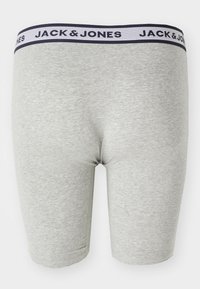Boxeri gri din bumbac, cu un abdomen elastic bleumarin pe care este inscripționat textul "JACK & JONES". Design ajustat, cu textură netedă și fără modele.