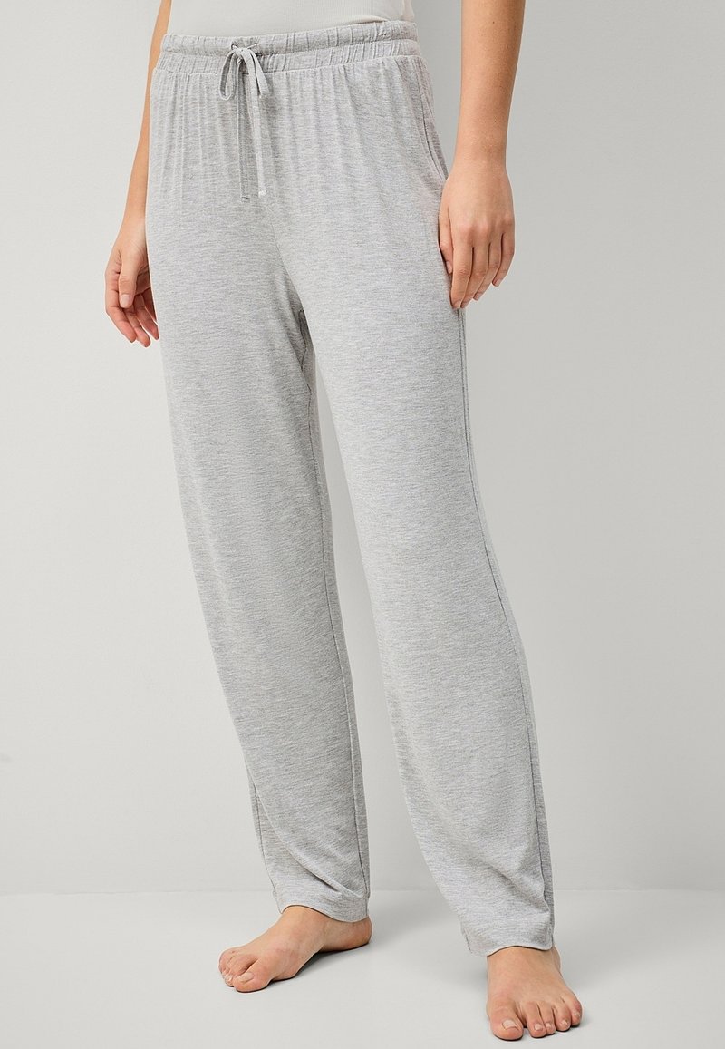 Lichtgrijze, zachte, ademende loungebroek met een elastische tailleband en verstelbaar trekkoord, met een relaxed fit en taps toelopende benen.