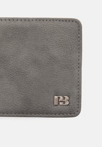 Gray leather wallet featuring a textured surface, visible stitching, and a silver metal logo in the bottom corner.