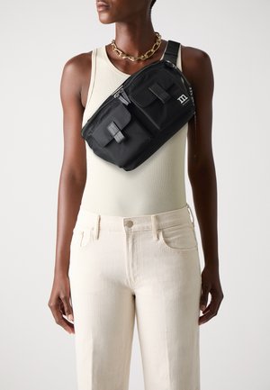 SLING BAG SOLID UNISEX - Cross body bag - black