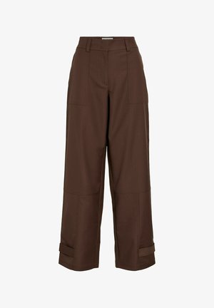 Braune weite Hose aus strukturiertem Stoff, mit zwei vorderen Taschen und einem umgeschlagenen Saum am unteren Ende.