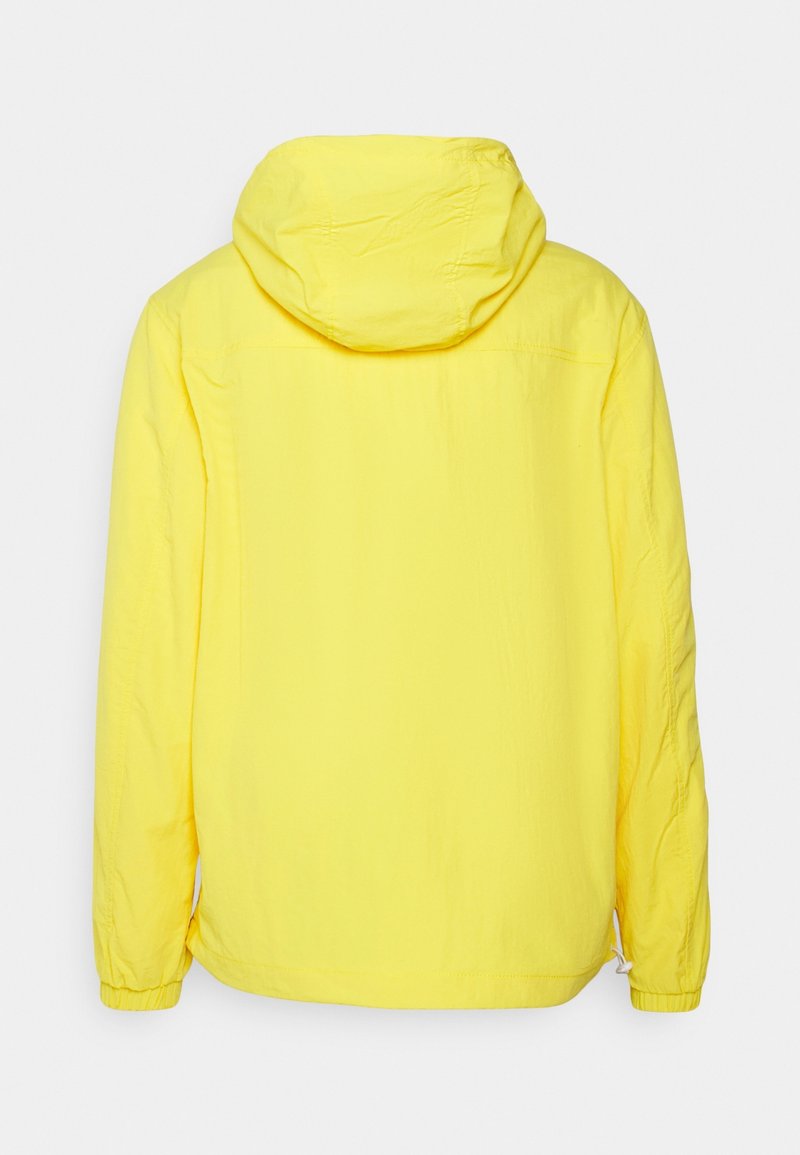 Tommy Jeans Windbreaker yellow/gelb (Pre-owned) Zalando