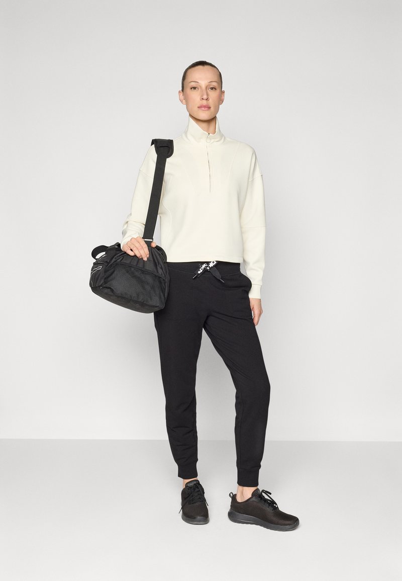 Pantalon Noir DKNY En Cuir Beurre Et Laine - Taille 2 Avec Bordure Rayures - Occasion Très Bon état - Style Cuir Mixte