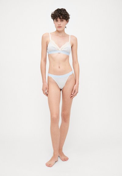 Light blue and white striped lingerie set with a lace trim bralette and matching thong. Features thin straps and a soft texture.