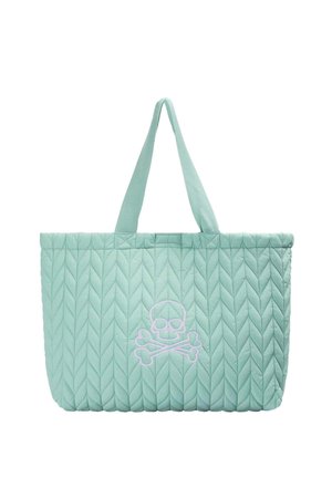Bolsa de mano acolchada de color verde claro con asas dobles y un diseño blanco de calavera y huesos cruzados en el centro delantero.