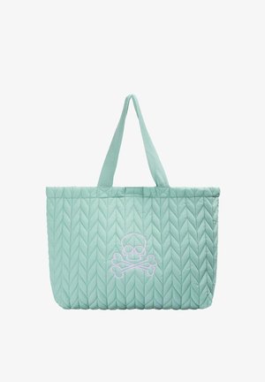 Sac cabas matelassé vert clair avec double anses et un motif blanc de tête de mort et os croisés au centre avant.