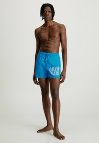 Calvin Klein Swimwear MEDIUM DRAWSTRING - Zwemshorts - clear turquoise