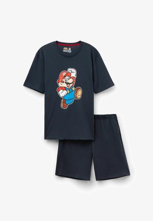 Dunkelblaues Baumwoll-Schlafset mit einem T-Shirt mit kurzen Ärmeln, das ein auffälliges Grafikmotiv eines Cartoon-Charakters zeigt, sowie passenden Shorts mit elastischem Bund.