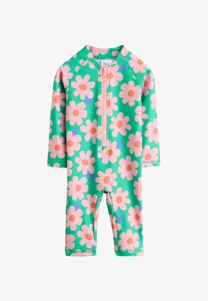 Kinderen rash guard in het groen met grote roze bloemen, lange mouwen en een rits aan de voorkant. Gemaakt van rekbaar, soepel materiaal.