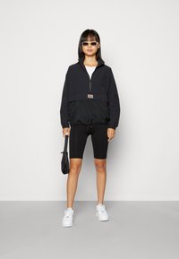 Nike Sportswear Wiatrówka