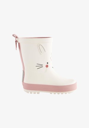 Stivale da pioggia bianco in gomma con accenti rosa, caratterizzato da un design con faccia di gatto, punta rotonda, suola testurizzata e un manico per una facile calzata.