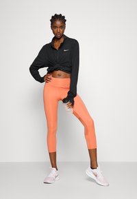 Nike Performance FAST CROP - Leggings - madder root/silver