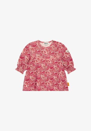 Top a maniche lunghe con motivo paisley rosso e rosa, con polsini arricciati, scollatura rotonda e un'etichetta sul lato sinistro. Materiale misto cotone.