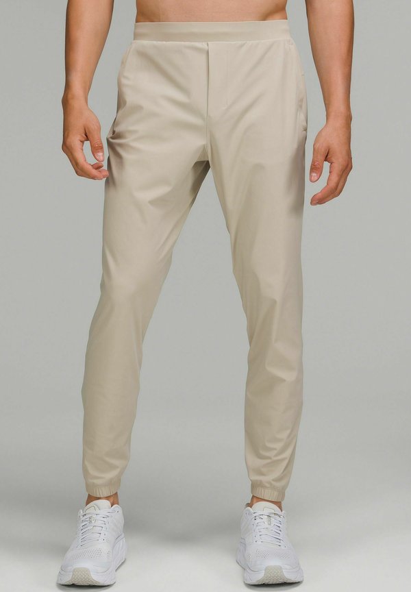 SURGE JOGGER - Jogginghose - raw linen