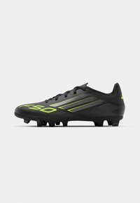 F50 CLUB - Botines de fútbol para terreno firme - core black/iron metallic/lucid lemon