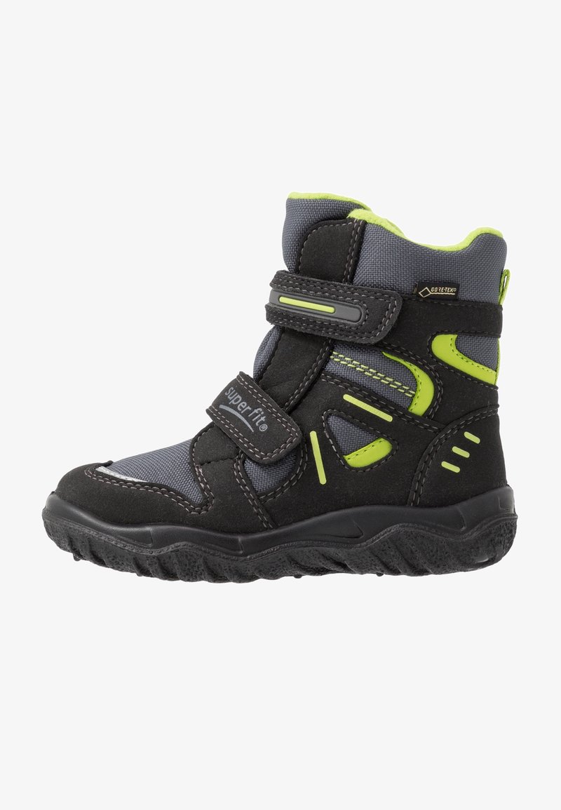 Botte d'hiver enfant noire et grise avec des touches vert citron, double bande Velcro, semelle texturée et étiquette Gore-Tex pour l'étanchéité.