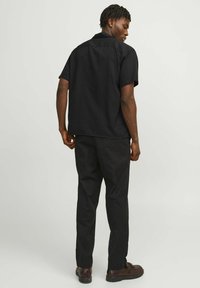 Jack & Jones JPRCCAARON RESORT - Marškiniai - black onyx