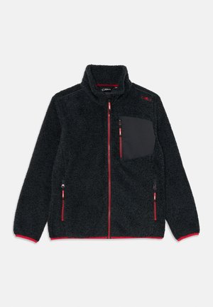 Črn flis jakna z rdečimi zadrgami, z žepom na prsih z zadrgo in visokim ovratnikom, razporejena na beli podlagi.