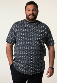 Košile s krátkým rukávem z námořnického plátna s diamantovým vzorem v bílé a světle modré barvě, s kulatým výstřihem a volným střihem.