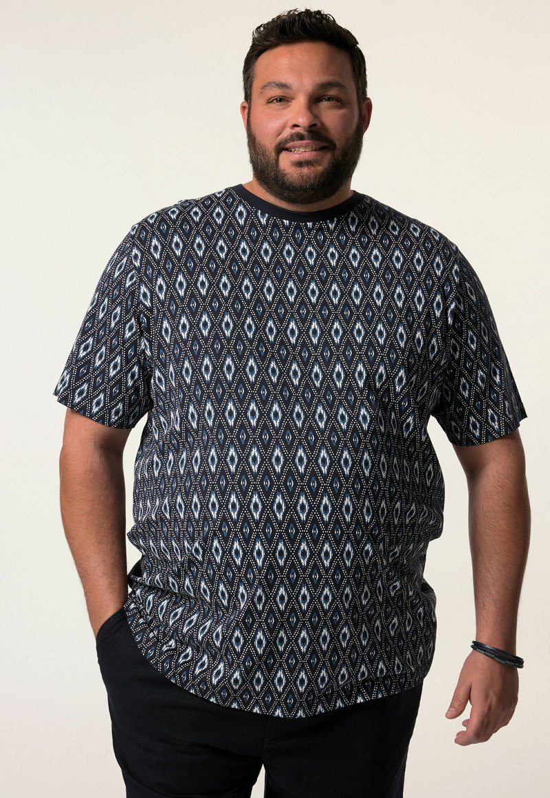 Košile s krátkým rukávem z námořnického plátna s diamantovým vzorem v bílé a světle modré barvě, s kulatým výstřihem a volným střihem.