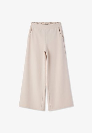 Pantaloni beige a gamba larga con vita elastica e tasche laterali, realizzati in morbido tessuto a maglia.