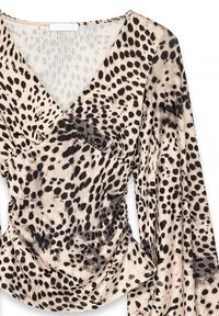 Leopard print blouse in beige and black, with a deep V-neckline, long sleeves, and gathered detailing at the waist. Soft, textured fabric.