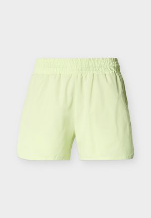 Lysegrønne treningsshorts laget av glatt, elastisk stoff med elastisk linning og uten synlige lommer eller pynt.