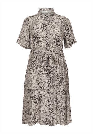 Button-up shirt dress in beige with black animal print. Short sleeves, tie waist, knee-length, and lightweight fabric with flowing texture.