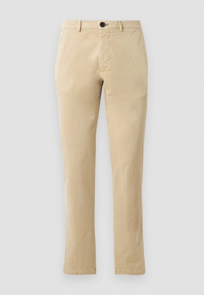 Bežīgas kokvilnas štrikotas bikses ar taisnu kāju dizainu, ar priekšējo pogu aizdari un smalkām šuvju detaļām. Gluda tekstūra un bez rakstiem.