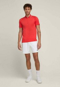 Wilson PLAYERS TEAM - Polo - infrared