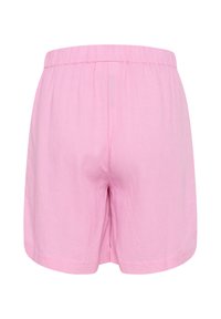 Pink cotton shorts with an elastic waistband, featuring a loose fit and smooth texture, designed for comfort and ease of movement.