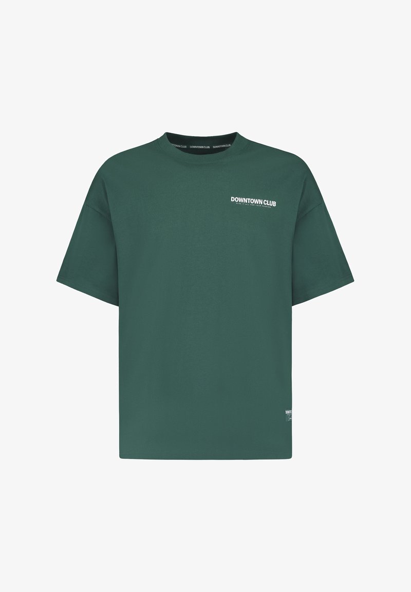 Green cotton t-shirt with short sleeves, crew neck, and "DOWNTOWN CLUB" printed in white on the left chest. Casual design, regular fit.
