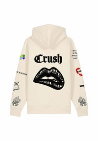 Felpa color crema con un grande logo nero "Crush" e una grafica di labbra sul retro, con diverse stampe colorate sulle maniche.
